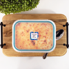 Square write-on labels on freezer meal labeled with cook time and temperature