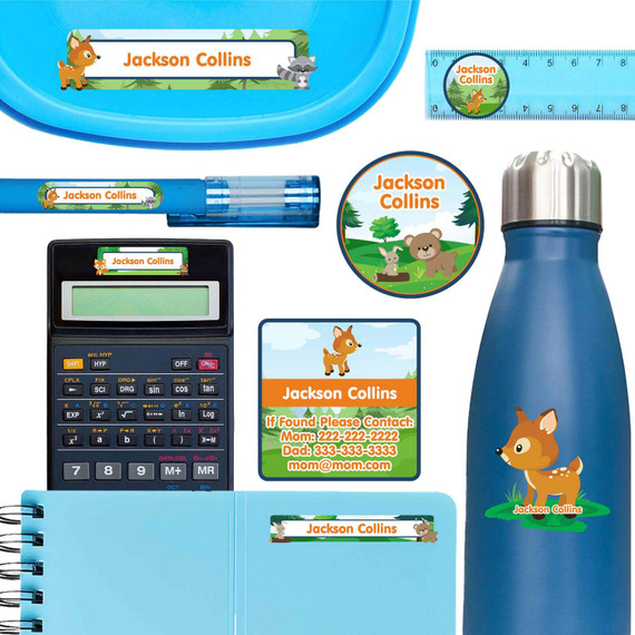 Forest Friends personalized name labels on calculator, notebook, and lunch container