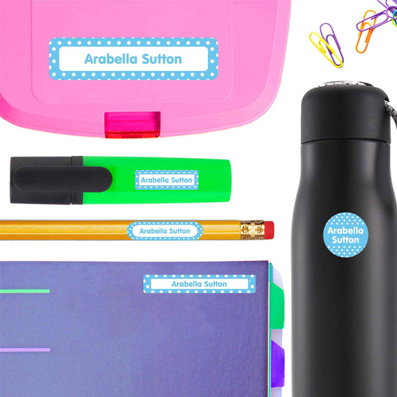 Close up of Dots custom name stickers applied to a student's marker for school.