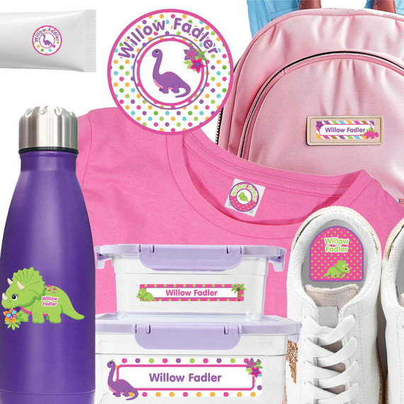 Close up of camp stickers applied to a toiletry bottle and camp labels for clothing attached to a kids jersey.