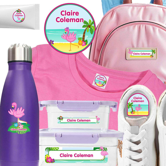 Close up of labels for camp applied to a clear soap dispenser and camp labels for clothes attached to a summer camp shirt.