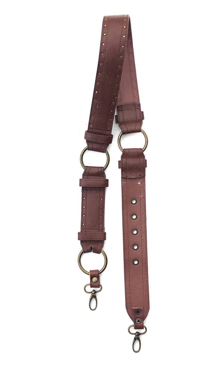 Brown strap with small gold studs rings and clasps