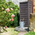 Norway Water Butt - Tall slimline wood effect water butt with silver watering can under tap