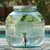 1.5 Gallon Authentic Glass Beverage Dispenser - 100% Recycled Glass with Cucumber Infused Water in Back Yard
