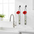 Florence Hanging Pendant Tube Vase with Wall Hook Duo in Bathroom with Gerberas