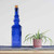 23.7 oz Ornate Recycled Glass Bottle With Cork Cobalt Blue with Plant