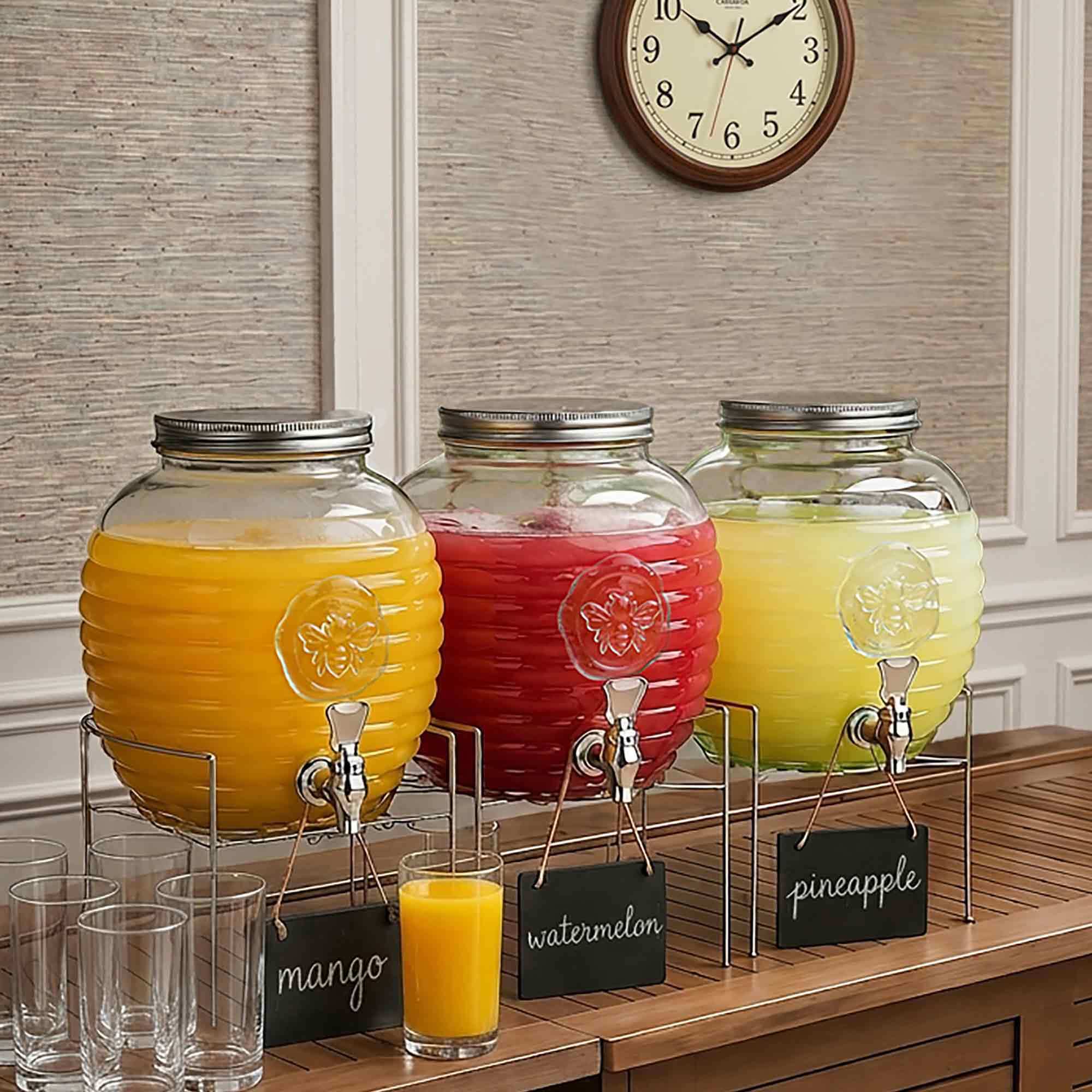 Bee Quenched Glass Drink Dispenser with Fruit Smoothies and Mimosas for Indoor Celebration