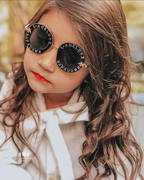 Stylish toddler bee sunglasses in black, white and pink colors. Trendy kids fashion eyewear by Cool Kids Bkly
