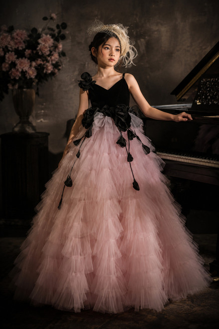 model girls  Luxury pink and black girls gown with dramatic layered tulle and floral detailing.