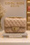 Coco Quilted Junior taupe quilted handbag with gold hardware and chain strap.by coolkidsbklyn