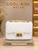 the Coco Quilted Junior white quilted handbag with gold hardware and chain strap.by coolkidsbklyn