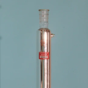 Rigid corrugated silver-coated vacuum jacket for thermal radiation isolation on a 24-inch glass column