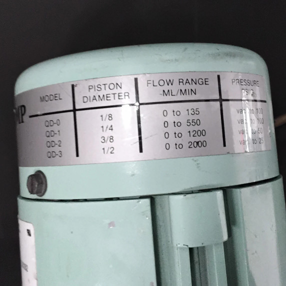 FMI QD high speed valveless piston pump with stainless steel R405 pump head for chemical metering applications