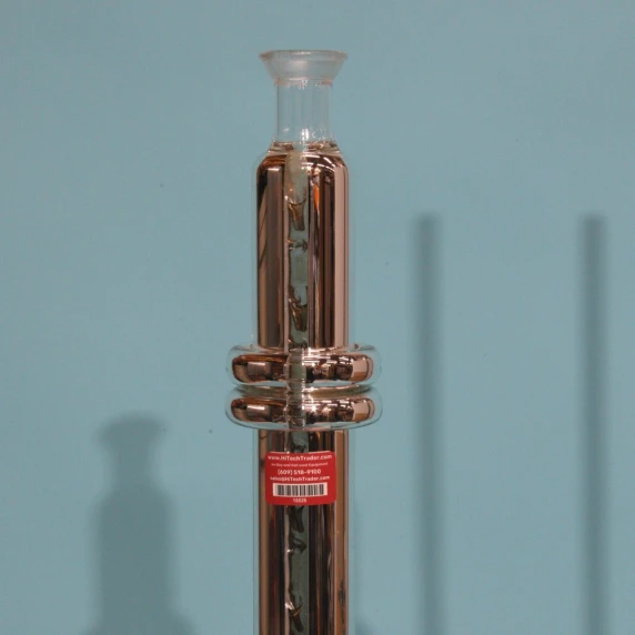 Corrugated expansion bellows on a silver-coated vacuum jacket for laboratory thermal stress relief
