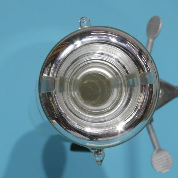 15 perforated plates and downcomers spaced two inches apart inside a 2-inch ID pilot-scale distillation column