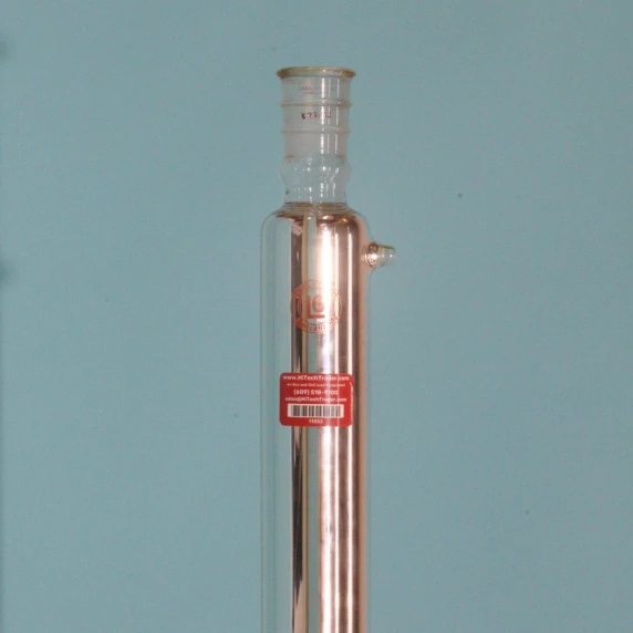 Rigid corrugated silver-coated vacuum jacket for thermal radiation isolation on a 24-inch glass column