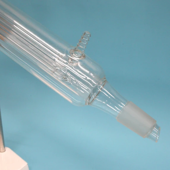 Oversized 34/45 standard taper ground glass joint on a pilot-scale laboratory condenser