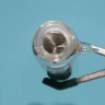 Internal glass protrusions for continuous in-line fluid homogenization inside a borosilicate mixing column