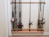 unfinished red oak rod rack installed with rods and reels