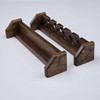 14 inch solid walnut fly rod rack from Chris Skrobarczyk Carpentry with spots for up to 6 fly fishing poles