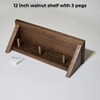 12 inch walnut shelf with 3 pegs