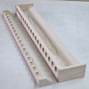 38 inch solid maple wooden fishing rod rack with 18 spaces for rods from Chris Skrobarczyk Carpentry