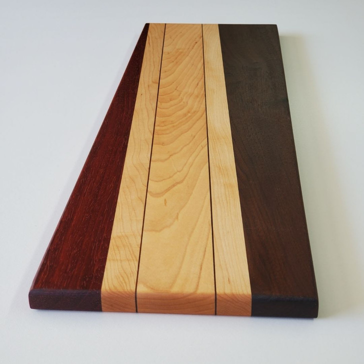 padauk, maple, and walnut cutting board