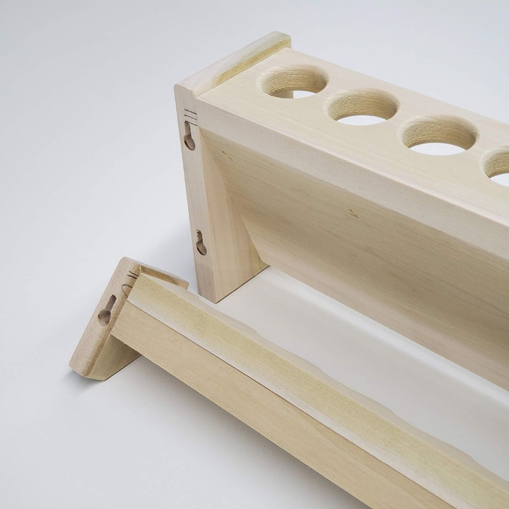 The keyholes in the back of both ends of the top and bottom pieces of this unfinished poplar wood fishing rod rack allow for concealed fastening with included hardware.