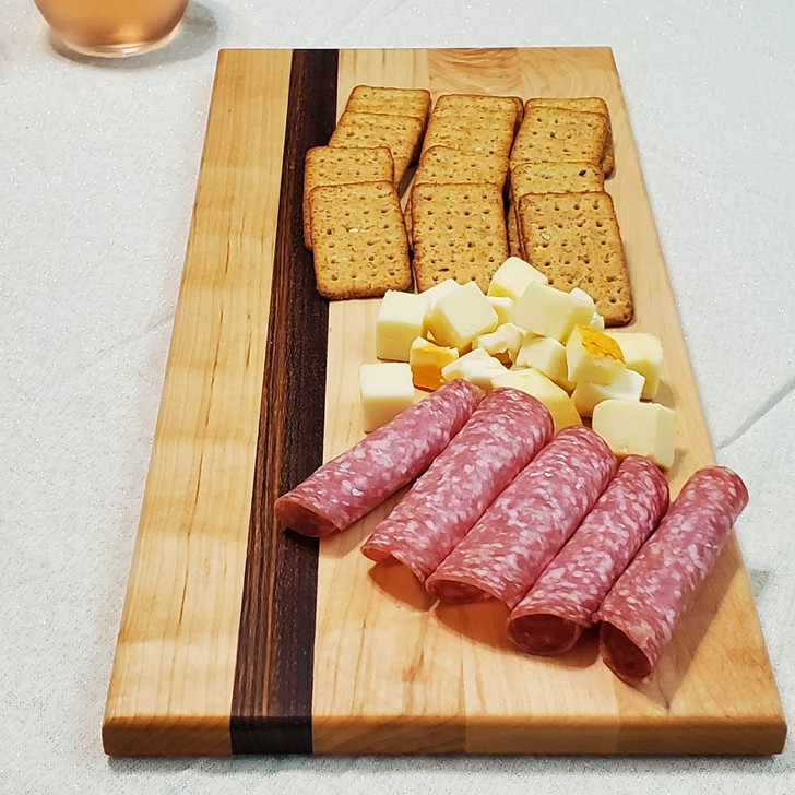 a little charcuterie on a solid maple and zebrawood cutting board