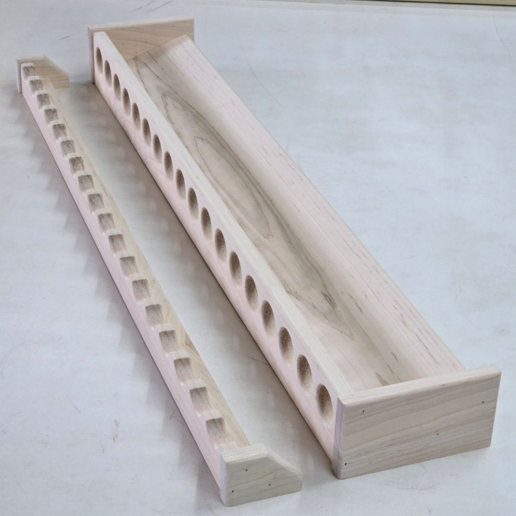 38 inch solid maple wooden fishing rod rack with 18 spaces for rods from Chris Skrobarczyk Carpentry