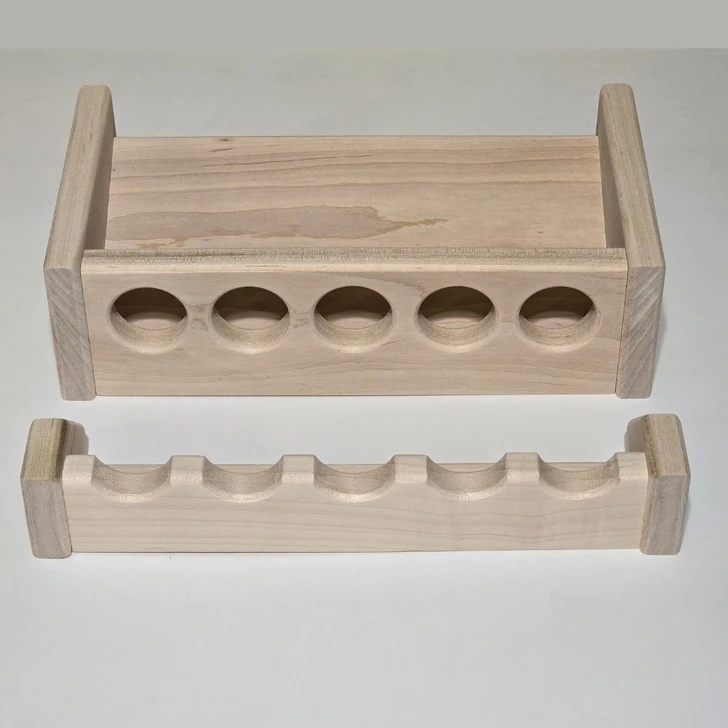 12 inch solid maple wooden fishing rod rack with 5 spaces for rods from Chris Skrobarczyk Carpentry