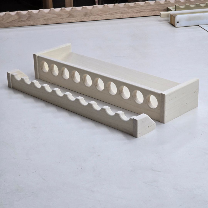 22 inch solid maple wooden fishing rod rack with 10 spaces for rods from Chris Skrobarczyk Carpentry