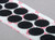 Image of a strip of coins made from VELCRO® Brand Tape with 72 Adhesive available at iTapeStore.com