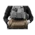 Front side view of a military tactical style hand warmer in ranger green attached to a MEPC and a man's hands inside