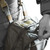 Greyed out Gas mask Bag showing person using quick deployment tab Greyed out Gas mask Bag showing person using quick deployment tab