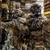 Tactical operators in full gear with Multicam PAPR pack systems
