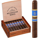 AJ Fernandez Cigars Toro 15 Ct. Box, open wooden box with 15 cigars displaying blue and gold bands, accompanied by a single cigar standing upright with matching band.