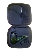 Ruckus Glass Proxy Glass Attachment- Green, inside view of a black carrying case with protective foam, containing a green glass proxy with a black top and a black cleaning cloth, suitable for vaping devices.