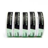 Sesh Tobacco Free Nicotine Pouch Wintergreen 6mg 1/5 Ct Roll, multiple white containers with black and green labels arranged in a row.