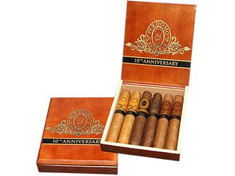 Perdomo 10th Anniversary Epicure 6 Ct. Box Sampler, open wooden cigar box showcasing six cigars inside. Perdomo 10th Anniversary Epicure 6 Ct. Box Sampler, open wooden cigar box showcasing six cigars inside.