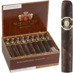 Macanudo Maduro Cigar Gigante 25 Ct. Box 6.00X60, open box displaying 25 cigars with dark Maduro wrappers and Gold and black labels. Macanudo Maduro Cigar Gigante 25 Ct. Box 6.00X60, open box displaying 25 cigars with dark Maduro wrappers and Gold and black labels.