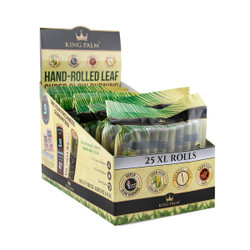 King Palm Pre-Roll Wraps - 25PK King XL 8pc Display, image showing a box with individually wrapped hand-rolled leaf filters and 25 XL rolls for smoking. King Palm Pre-Roll Wraps - 25PK King XL 8pc Display, image showing a box with individually wrapped hand-rolled leaf filters and 25 XL rolls for smoking.