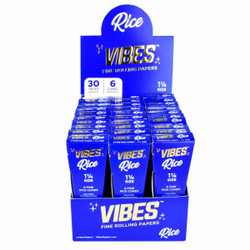 Vibes Rolling Paper VIBES Rice Cones Rolling Paper - 1 1/4 30 Pc, image of blue packaging box containing 30 packs of rice cones rolling papers with product details. Vibes Rolling Paper VIBES Rice Cones Rolling Paper - 1 1/4 30 Pc, image of blue packaging box containing 30 packs of rice cones rolling papers with product details.