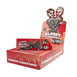 Lion Rolling Circus 1 1/4" Bloody Strawberry Rolling Papers, colorful packaging with tattoo-style illustrations of two men and bold text.
