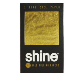 Shine Rolling Paper, 24K Gold Rolling Paper in Kingsize, showcased in black packaging with a large gold paper visible through a transparent window.