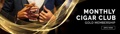 Gold Level Cigar Club, promotional image for monthly cigar club gold membership with a person holding a cigar and glass of whiskey.