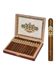 Ashton Cigars Ashton Symmetry Prestige Cigars 25Ct.Box, open wooden cigar box containing 25 cigars with decorative inside lid design and a single cigar standing outside the box.