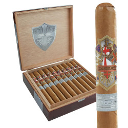 AJ Fernandez Ave Maria Immaculata Churchill Cigars 20Ct. Box, a wooden box containing twenty cigars with detailed band designs, and an individual cigar showing the religious and heraldic imagery on the band.
