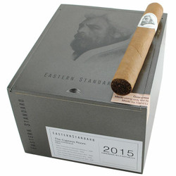 Caldwell Collection - Eastern Standard Cypress Room Cigars 24Ct. Box, grey box featuring an image of a man's profile and a single cigars positioned on top. Caldwell Collection - Eastern Standard Cypress Room Cigars 24Ct. Box, grey box featuring an image of a man's profile and a single cigars positioned on top.