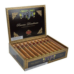 Carlos Torano Decadencia Churchill Cigars 20Ct. Box, an open wooden cigar box displaying neatly arranged cigars with decorative packaging, grapevine artwork, and a black and gold interior design.
